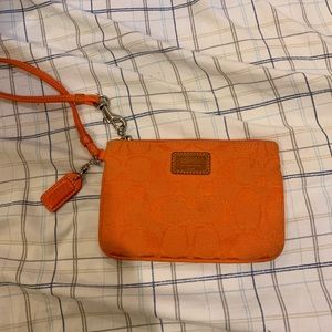 Coach orange purse matching wristlet